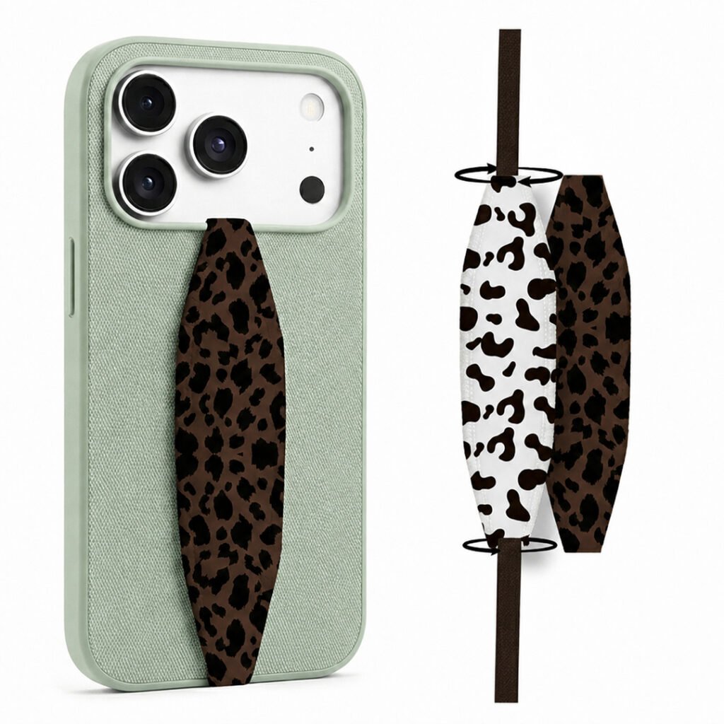 Animal theme phone grip strap attached to smartphone case, held securely in hand