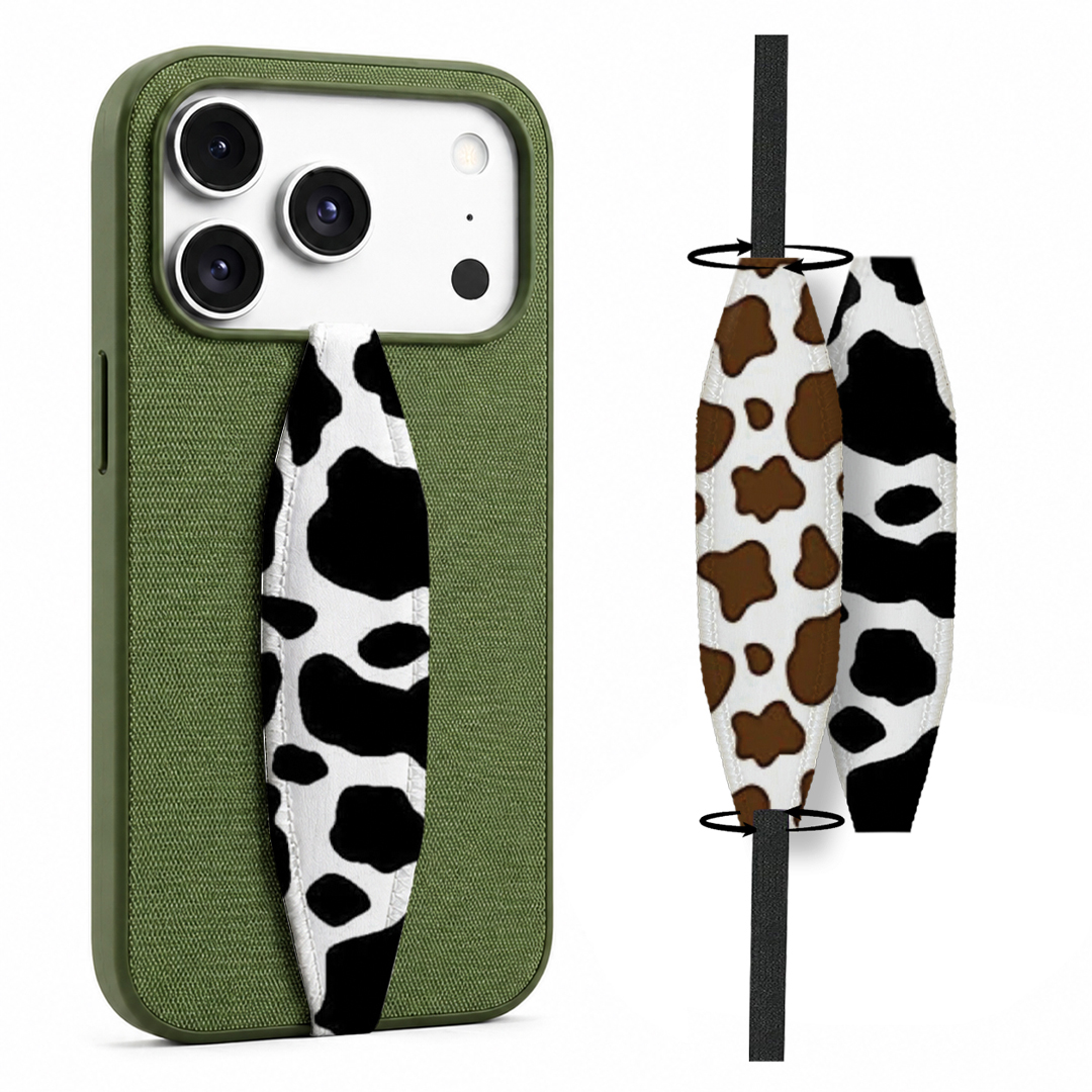 Animal theme phone grip strap attached to smartphone case, held securely in hand Animal theme phone grip strap attached to smartphone case, held securely in hand